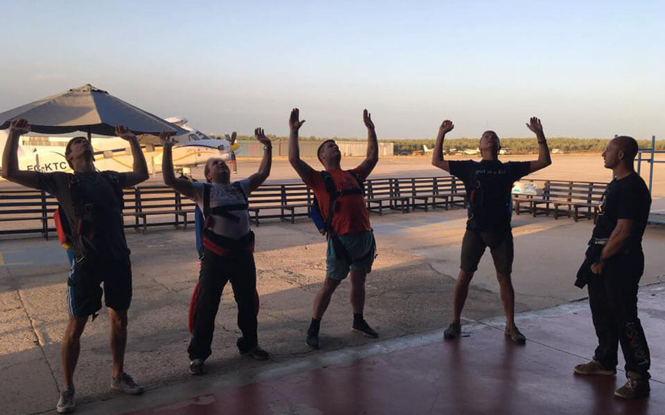 Ground school training at sunset over in Skydive Spain with Active Skydiving AFF courses.